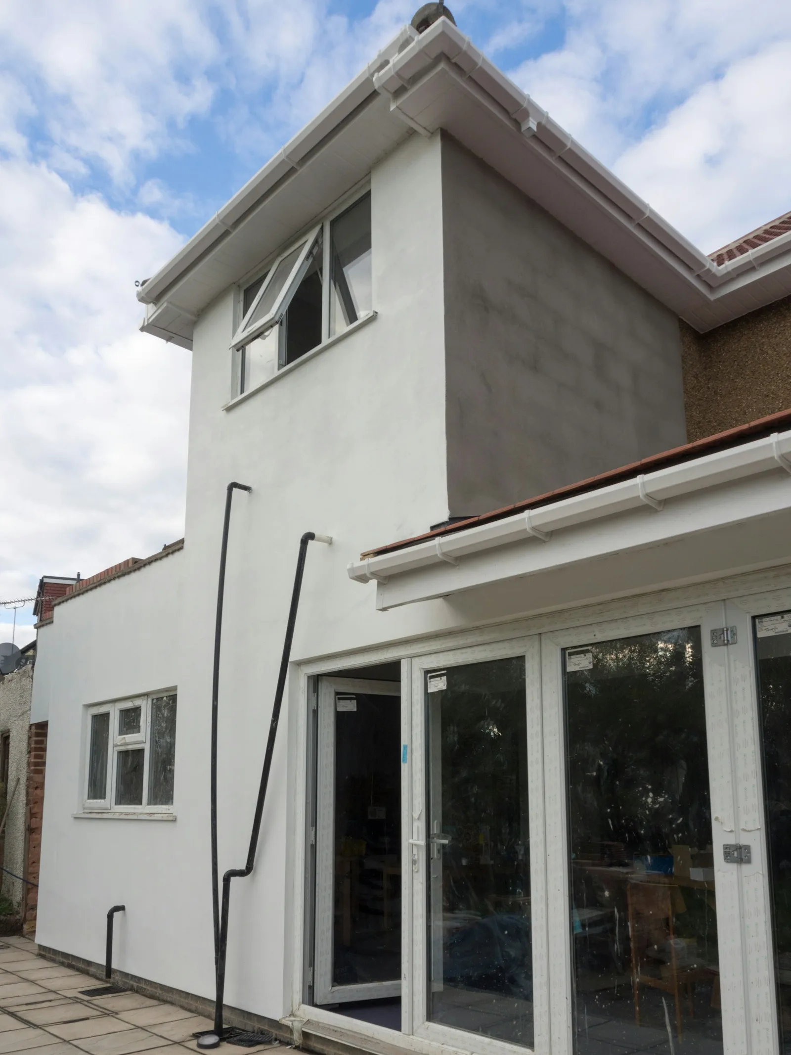 House extension part-way through being rendered